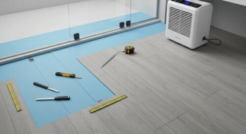 A detailed photorealistic image of a modern bathroom with vinyl flooring installation in progress, showing tools like a utility knife and measuring tape on the floor, with visible moisture barrier und