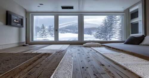 A detailed cross-section of a modern home floor in a continental climate, showing layers: geothermal ventilation ducts below, insulation, underfloor heating pipes, vapor barrier, and luxury vinyl tile